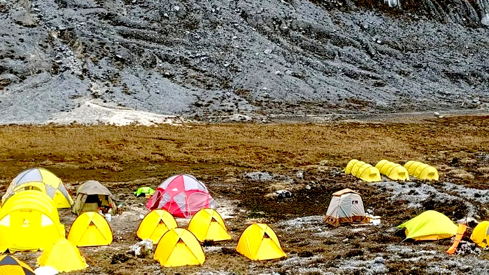 Yellow Valley Base Camp below the limestone walls of Carstensz Pyramid